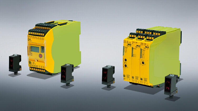 与Pilz一起为二级包装领域提供安全的纸板进料：经TÜV-SÜD认证的解决方案包括安全的小型控制器PNOZmulti 2和模块化安全继电器myPNOZ。每个进料装置增加了两个特殊的光学传感器。(Photo © Pilz GmbH & Co. KG)